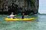 Two girls Kayaking in Pi Ley Bay on Phi Phi Ley Island