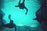 3 snorkeling girls diving below Phi Phi Island