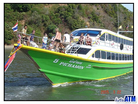 Pichamon boat from Krabi to Phi Phi Island under Phi Phi Ley Photo
