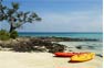 Sea kayaks on a beach ion the Phi Phi islands