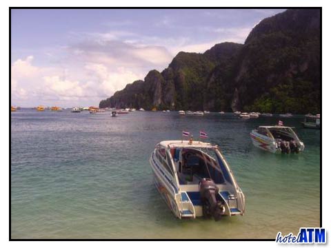 Hire speedboat in sunny Phi Phi bay