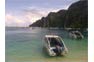 Hire speedboat in sunny Phi Phi bay