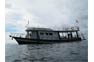 Dive boat approaching Koh Bida near Phi Phi