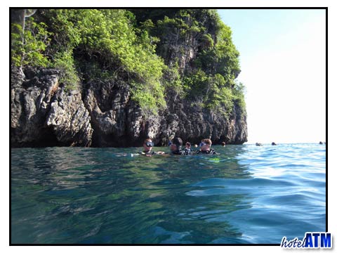 Back to the water surface while diving at Koh Bida