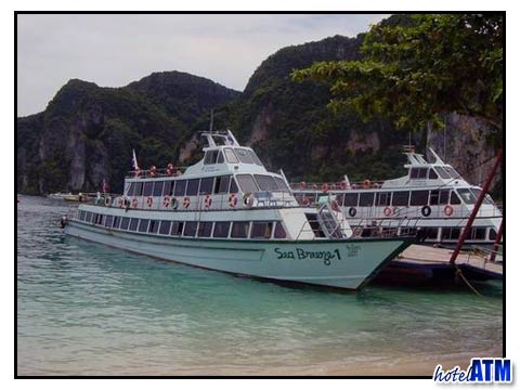 Ferry boats at Phi Phi pier on a daytrip from Krabi