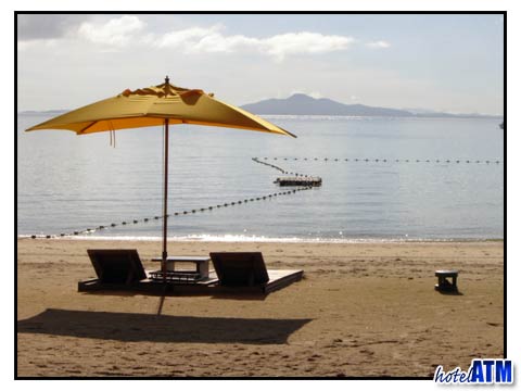 Beachfront sun loungers on Phi Phi Island