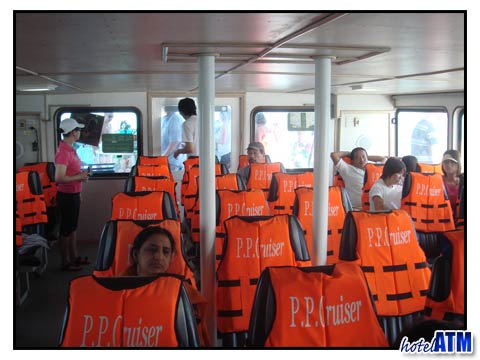 Seats with swim vests inside the Phi Phi Cruiser Ferry
