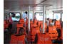Seats with swim vests inside the Phi Phi Cruiser Ferry