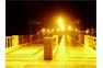 Phi Phi main ferry pier under golden night floodlights