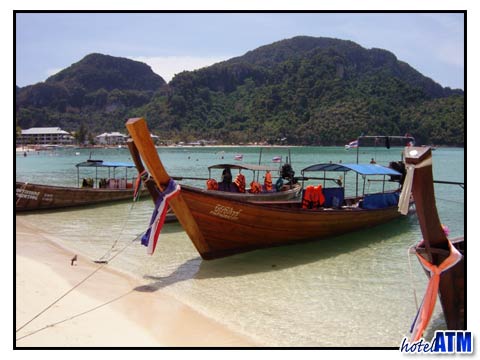Longtail boats on the sand beach of Phi Phi
