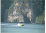 Speedboat under the Phi Phi Island cliffs